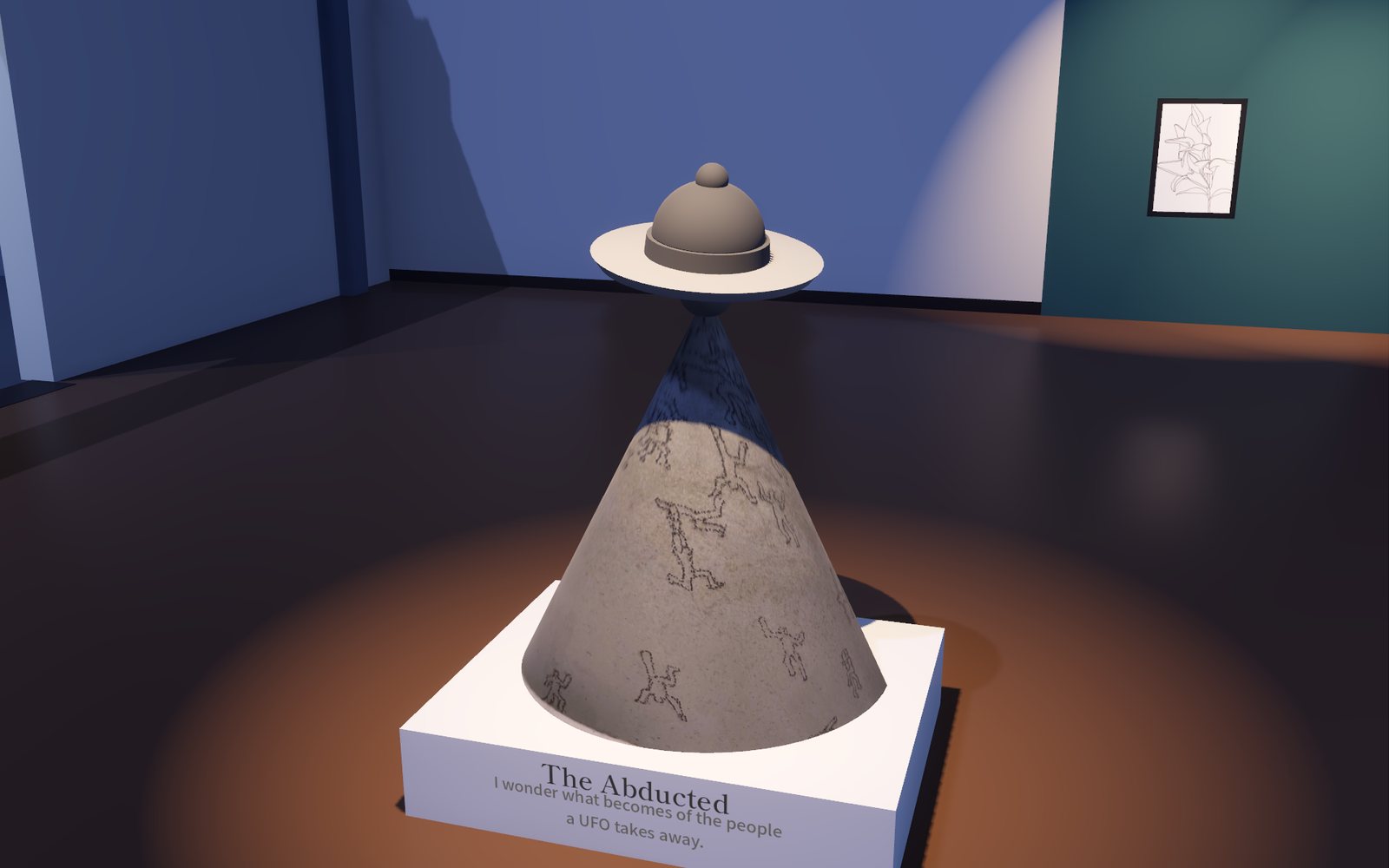 Close-up of the clay UFO sculpture on its plinth, with its name card